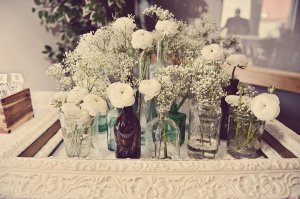 vintage-wedding-reception-flowers-white-centerpieces-mason-jars1.jpg